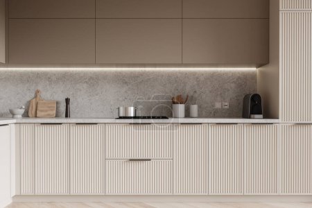 Foto de Interior de la elegante cocina con paredes grises, armarios beige y armarios con cocina incorporada y cómodos cajones para todos sus platos y electrodomésticos. renderizado 3d - Imagen libre de derechos