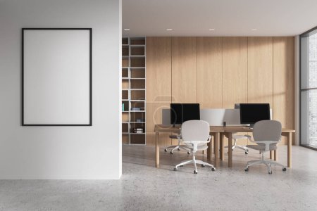 Photo for Modern coworking room interior with pc computers on tables, concrete floor. Business workplace with shelf and panoramic window on skyscrapers. Mock up canvas poster. 3D rendering - Royalty Free Image