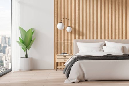 Cozy home bedroom interior with bed, nightstand with decoration and plant on hardwood floor. Sleep room with panoramic window on Kuala Lumpur skyscrapers. 3D rendering