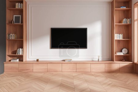 Téléchargez les photos : Salon intérieur moderne avec une armoire TV en bois et des étagères sur un mur blanc, décoré avec des livres et un décor, la lumière. Rendu 3D - en image libre de droit