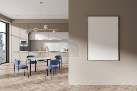 Photo for Beige home kitchen interior with eating table and blue chairs, hardwood floor. Cooking cabinet near panoramic window on skyscrapers. Mock up canvas poster on partition. 3D rendering - Royalty Free Image
