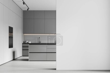 Stylish grey home kitchen interior with bar island and cooking cabinet, oven mounted and kitchenware on counter. Mock up empty wall partition. 3D rendering