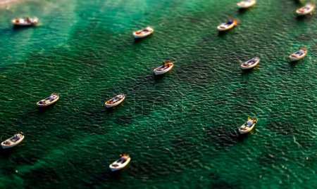 Photo for Boats drifting at ocean - Royalty Free Image