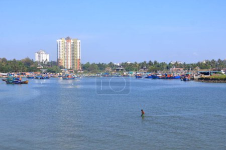 Photo for December 29 2022 - Kannur, Kerala, India: Fishing Harbour with colorful fishing boats after fishing in the morning - Royalty Free Image