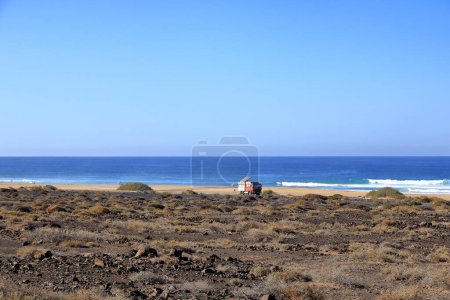 November 19 2023 - Playa de Cofete, Jandia, Fuerteventura, Canary Islands in Spain: people enjoy the freedom at the atlantic ocean on a sunny day