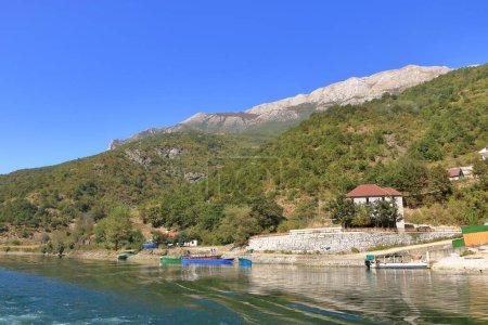 Photo for Settlement alongside lake Koman, Albania - Royalty Free Image