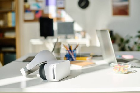 Photo for Close-up of VR glasses lying on on workplace of developer in office - Royalty Free Image