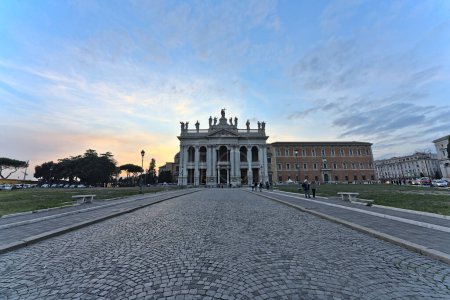 Photo for Outside of the Basilica of St. John Lateran with few pedestrians walking - Royalty Free Image
