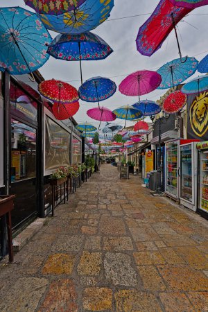 Photo for Skopje old bazar alley with some kind of umbrella installment on the ceiling - Royalty Free Image