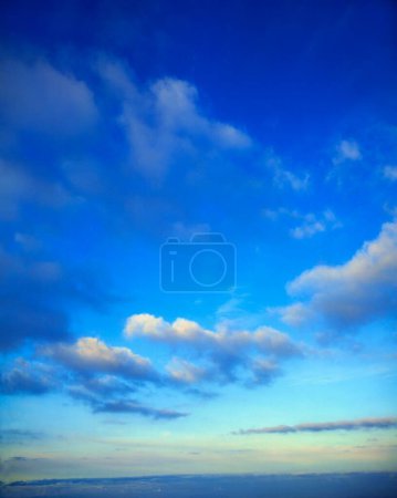 Photo for Fluffy clouds in the sky - Royalty Free Image