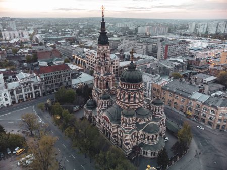 Holy Annunciation Cathedral aerial view with evening cloudscape. Kharkiv city orthodox church in downtown, Ukraine