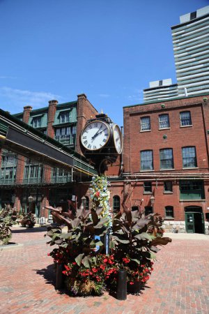 Photo for The clock in the Historic Distillery District in Toronto, Canada. High quality photo - Royalty Free Image