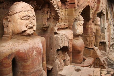 Sacred sculptures carved into rock in Gwalior, India. High quality photo