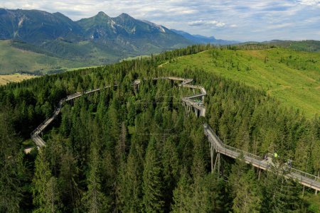 Wooden bridge over the trees in Bahledova Valley attraction in S