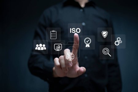 Photo for ISO Certification of standards quality control assurance business technology concept. Businessman using virtual screen iso certification icon to guarantee. - Royalty Free Image