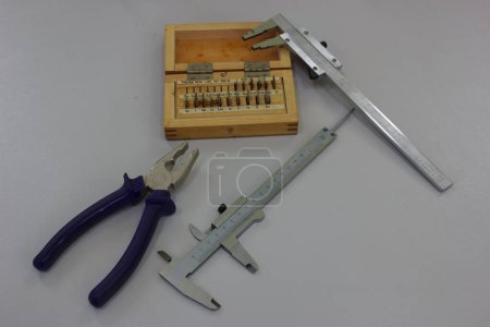 Foto de Precision measuring equipment micrometer caliper and pliers - Imagen libre de derechos