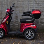 a red four-wheeler for pesrons with some form of mobility impairment