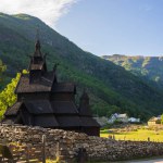 The restored Borgund Stave Church located in Vestland county, Norway, was built around 800 years ago. The church is photographed on a summer evening on a cloudless day. 
