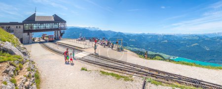 Foto de Landscape with Schafberg cog railway train station Schafbergbahn, mountains and a lake Wolfgangsee in background, Alps, Austria - Imagen libre de derechos