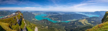 panoramic view from the top of Mount Schafberg over the landscape with mountains and Lake Mondsee and Lake Attersee, Alps, Austria