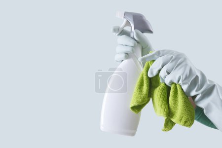 Photo for Cleaning service and solutions. Hands with gloves, green rags and spray bottle isolated on banner with copy space, search cleaning company online for a quote and support. Shopping products online. - Royalty Free Image