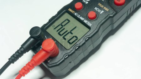 Photo for A multimeter is a versatile electronic device used for measuring various electrical parameters such as voltage, current, and resistance - Royalty Free Image