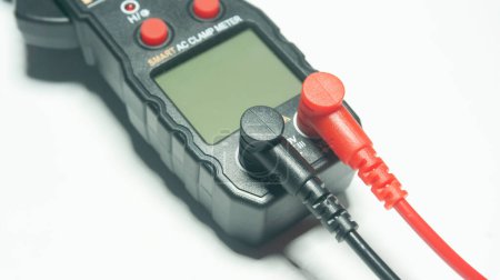 Photo for A multimeter is a versatile electronic device used for measuring various electrical parameters such as voltage, current, and resistance - Royalty Free Image