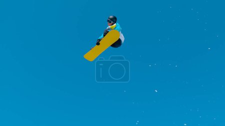 Téléchargez les photos : BOTTOM UP: Spectacular shot of a snowboarding pro doing a tumbling grab stunt while training in Vogel ski resort snowpark. Snowboarder soars through the air and does a breathtaking spinning trick. - en image libre de droit