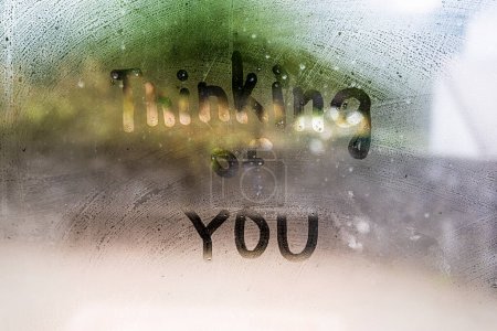 Photo for Thinking of you text on  window - Royalty Free Image