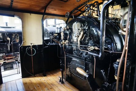 Photo for Old steam locomotive 910,001 produced from 1905 to 1908 in the National Museum of the Railway in Pietrarsa, Campania, Italy - Royalty Free Image