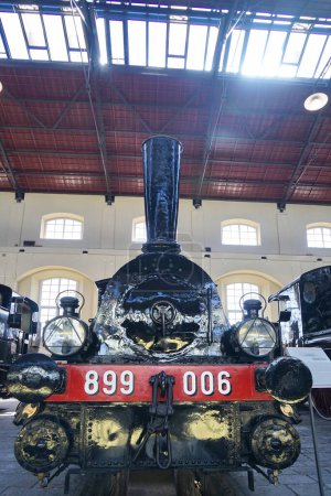 Photo for Old steam locomotive 899.006 produced from 1881 to 1905 in the National Museum of the Railway in Pietrarsa, Campania, Italy - Royalty Free Image