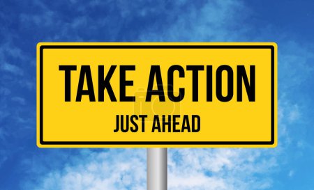 Take Action just ahead road sign on blue sky background