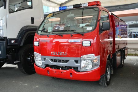 Photo for PASAY, PH - SEPT 17 - Isuzu traviz firetruck at Philippine International Motor Show on September 17, 2022 in Pasay, Philippines. P.I.M.S. is a car show event held in Philippines. - Royalty Free Image