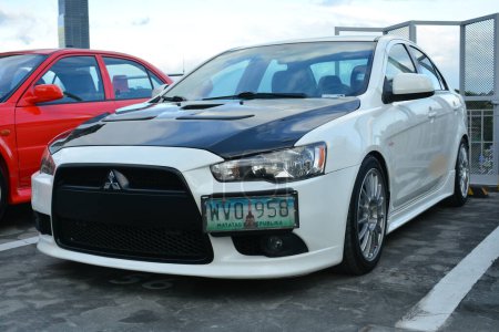 Photo for SAN JUAN, PH - FEB 26 - Mitsubishi lancer at East side collective car meet on February 26, 2023 in San Juan, Philippines. East side collective is a car meet event in Philippines. - Royalty Free Image