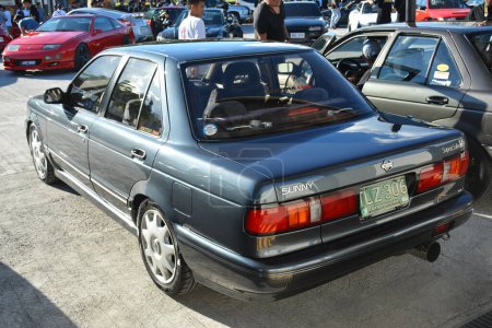 Photo for PASIG, PH - APR. 29- Nissan sunny at Nissan Festival on April 29, 2023 in Pasig, Philippines. Nissan Festival is a car meet event held in Philippines. - Royalty Free Image