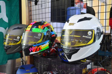 Photo for PASIG, PH - MAY 20 - Roc motorcycle helmets at Ride Ph on May 20, 2023 in Pasig, Philippines. Ride Ph is a motorcycle show event in Philippines. - Royalty Free Image