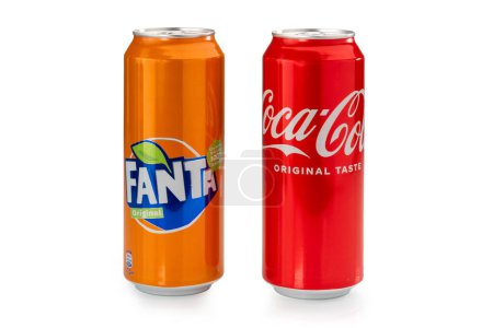 Foto de Italy - january 14, 2023: Can of Coca Cola original taste with can of Fanta Original soft drink with orange juice isolated on white with clipping path included. 500ml cans - Imagen libre de derechos