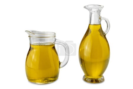 Téléchargez les photos : Extra virgin olive oil in 250 ml glass jug and in Egyptian-style glass cruet isolated on white with clipping path - en image libre de droit