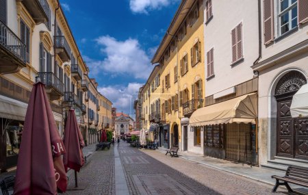 Photo for Bra, Cuneo, Piedmont, Italy - May 09, 2023: Via Cavour, central pedestrian street with the church of San Rocco in the background - Royalty Free Image