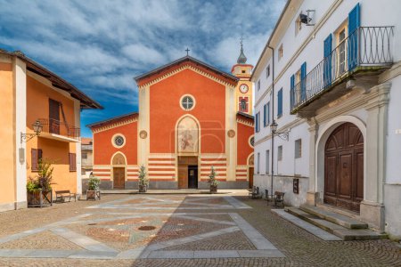 Sanfront, Cuneo, Italy - May 03, 2024: the parish church of San Martino in Piazza Ferrero paved with porphyry and stone slabs in the historic village in the Po Valley