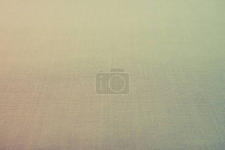 Photo for Pale background fabric texture. A piece of woolen cloth is neatly laid out on the surface. Weave and textile texture. Dress fabric or for kitchen needs, tablecloth or curtains, close-up. Dash. - Royalty Free Image