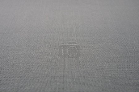 Photo for Gray background fabric texture. A piece of woolen cloth is neatly laid out on the surface. Weave and textile texture. Dress fabric or for kitchen needs, tablecloth or curtains, close-up. Dash. - Royalty Free Image