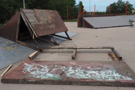 Photo for Aftermath of the hurricane July 19, 2023 Sremska Mitrovica, Serbia. Cycling and skateboarding equipment moved by a hurricane wind on a sports field. State of emergency after a catastrophic storm - Royalty Free Image