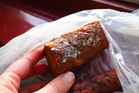 Raw smoked sausage became moldy while it was in a plastic bag. A mold or mould. The dust-like, colored appearance of molds is due to the formation of spores containing fungal secondary metabolites