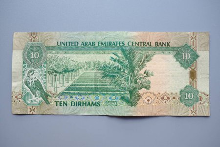 Photo for The Arab Emirates Dirham Arabic. ISO code AED is the official currency of the United Arab Emirates. Dirham is subdivided into 100 fils. Dirham was officially pegged to the IMF special drawing rights. - Royalty Free Image