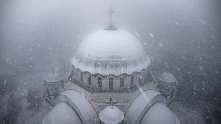 Photo for View of Saint Sava, orthodox church in Belgrade, Serbia in winter snowing time. - Royalty Free Image