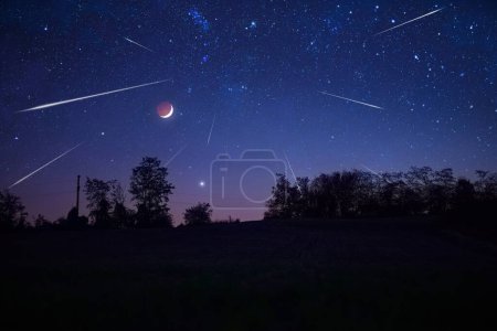 Photo for Starry Milky Way skies with comet and meteor shower, falling and shooting stars. - Royalty Free Image