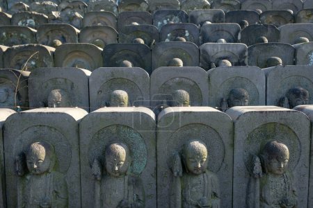 Photo for Tokyo, Japan - March 3, 2023: Stone statues of Jizo, the patron deity of children and travelers, in Jomyoin Temple located at Ueno Park in Tokyo, Japan. - Royalty Free Image