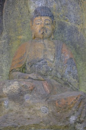Foto de Usuki, Japón - 1 de mayo de 2023: Detalle de uno de los Budas de Piedra Usuki. Son un conjunto de esculturas talladas en roca durante el siglo XII en Usuki, Japón. - Imagen libre de derechos