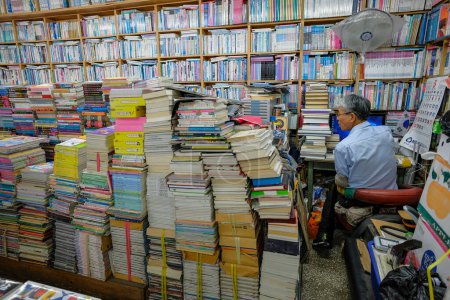 Photo for Busan, South Korea - May 26, 2023: A book seller on Bosu-dong Book Street, it is a famous book selling street in Busan, South Korea. - Royalty Free Image